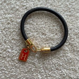 Beautiful new signature (H) and leather bracelet